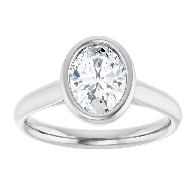 Bezel Set Oval Diamond engagement Ring on white gold showing center stone