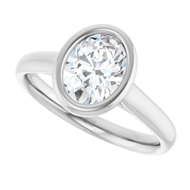 Bezel Set Oval Diamond engagement Ring on white gold sideway picture showing center stone