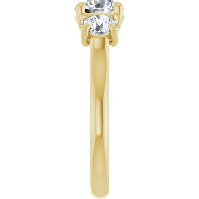 Three Stone Round Diamond engagement Ring on yellow gold showing shank from the side