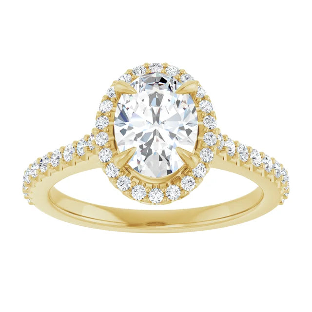 Halo Style assented shank oval solitaire diamond engagement ring on 14K Gold showing center stone
