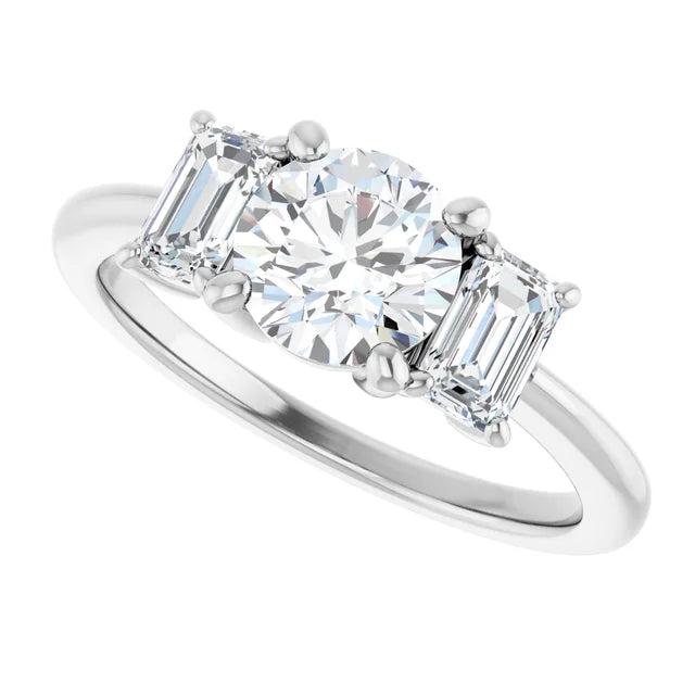 Round and emerald three stones Diamond engagement Ring for women on white gold sideway picture showing three stones
