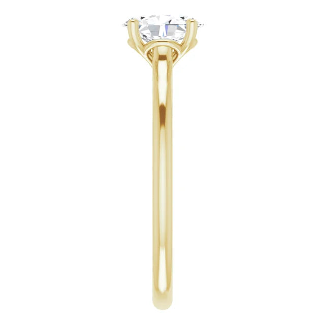 Heart round diamond engagement ring on yellow gold showing shank