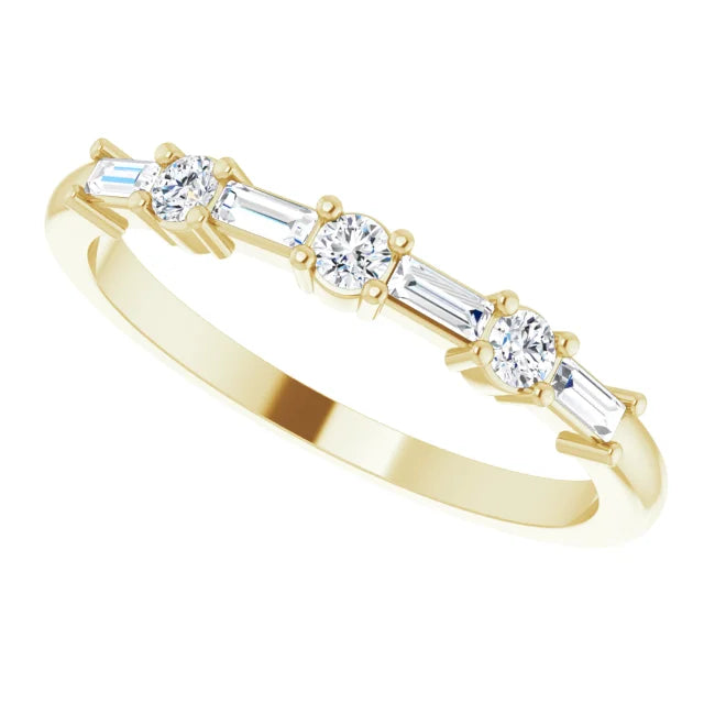 Round and Baguette diamond wedding band for women on yellow gold sideways picture 